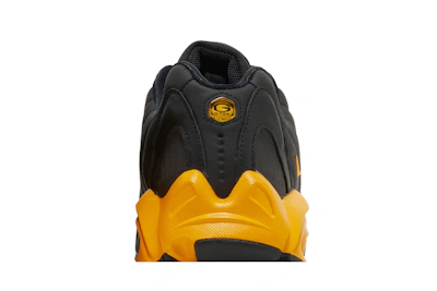 NOCTA x Nike Hot Step Air Terra 'Black University Gold'