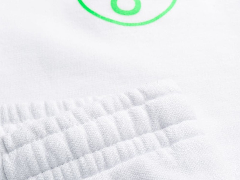 Order オフホワイト アーチシェイプ スウェットパンツ (白/緑) OMCH020R20E300060145