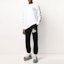 Shop OFF-WHITE SS20 Pantalones Joggers de Punto Negro con Rayas Doradas OMCH022R20E300021048