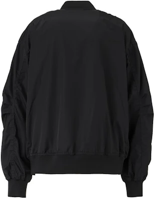 Chaqueta negra unisex Onitsuka Tiger con cremallera y cuello alto. 2183B316-001 Lookbook Chaqueta negra unisex Onitsuka Tiger con cremallera y cuello alto. 2183B316-001