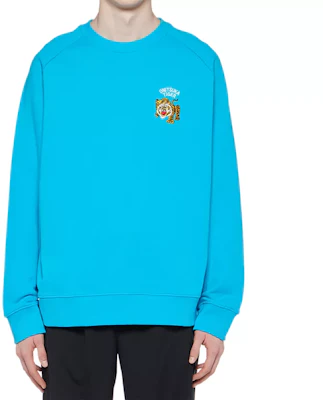 Sudadera Unisex Onitsuka Tiger Azul Oversize de Manga Larga Cuello Redondo. 2183B183-301 Shop Sudadera Unisex Onitsuka Tiger Azul Oversize de Manga Larga Cuello Redondo. 2183B183-301