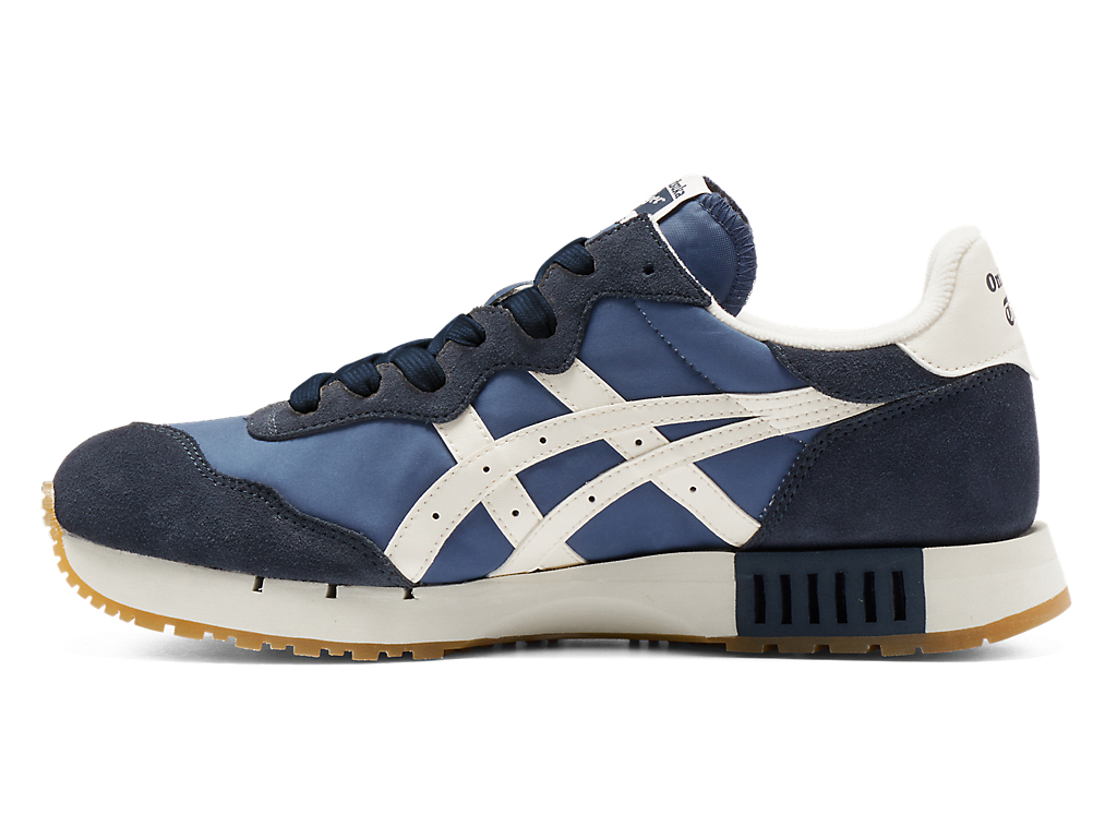 Shop Onitsuka Tiger X-Caliber ''Grand Shark Cream'' Scarpe da Ginnastica. 1183C289-400
