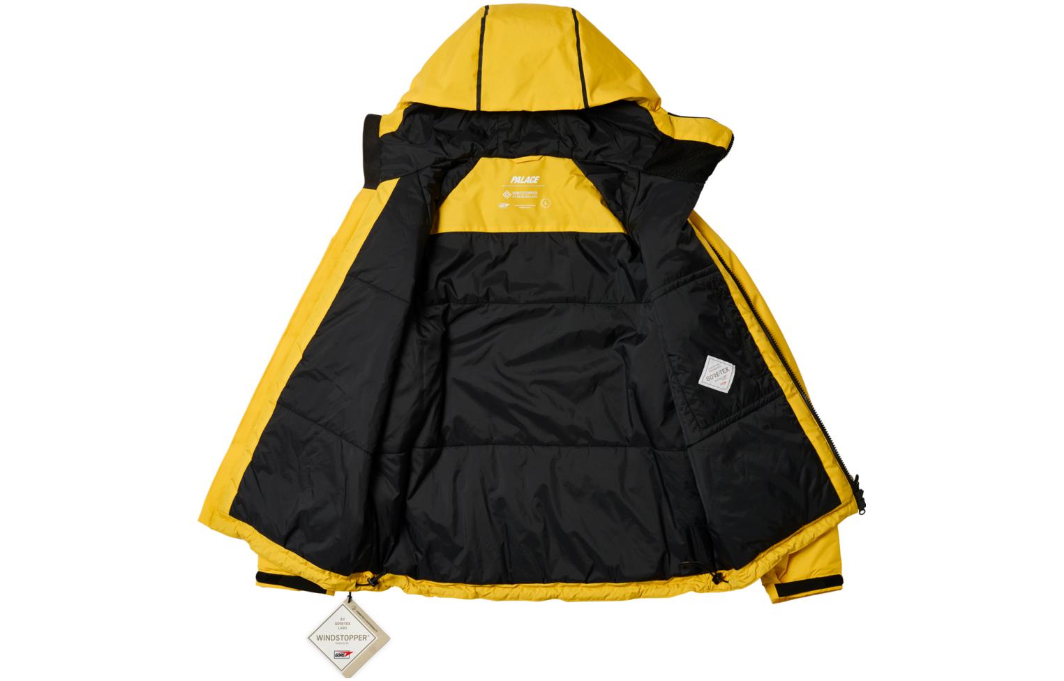 Shop Chaqueta con capucha impermeable amarilla unisex PALACE ULTIMO FW23. P25JK122