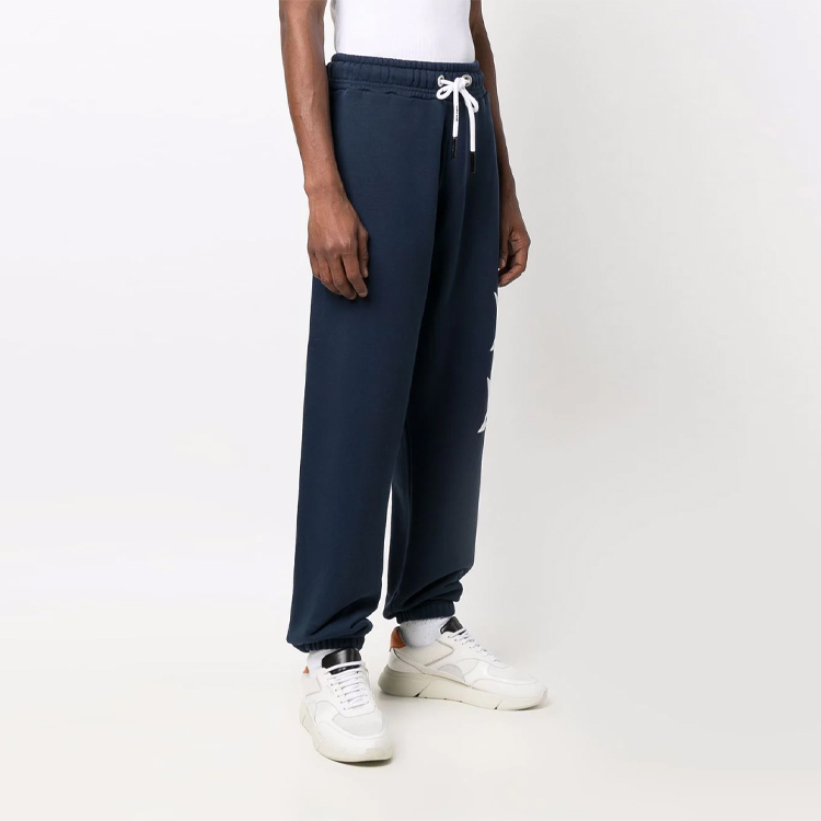 Shop PALM ANGELS レーシングスター ロゴ プリント ジョガーパンツ ブルー メンズ. PMCH011F21FLE0011001