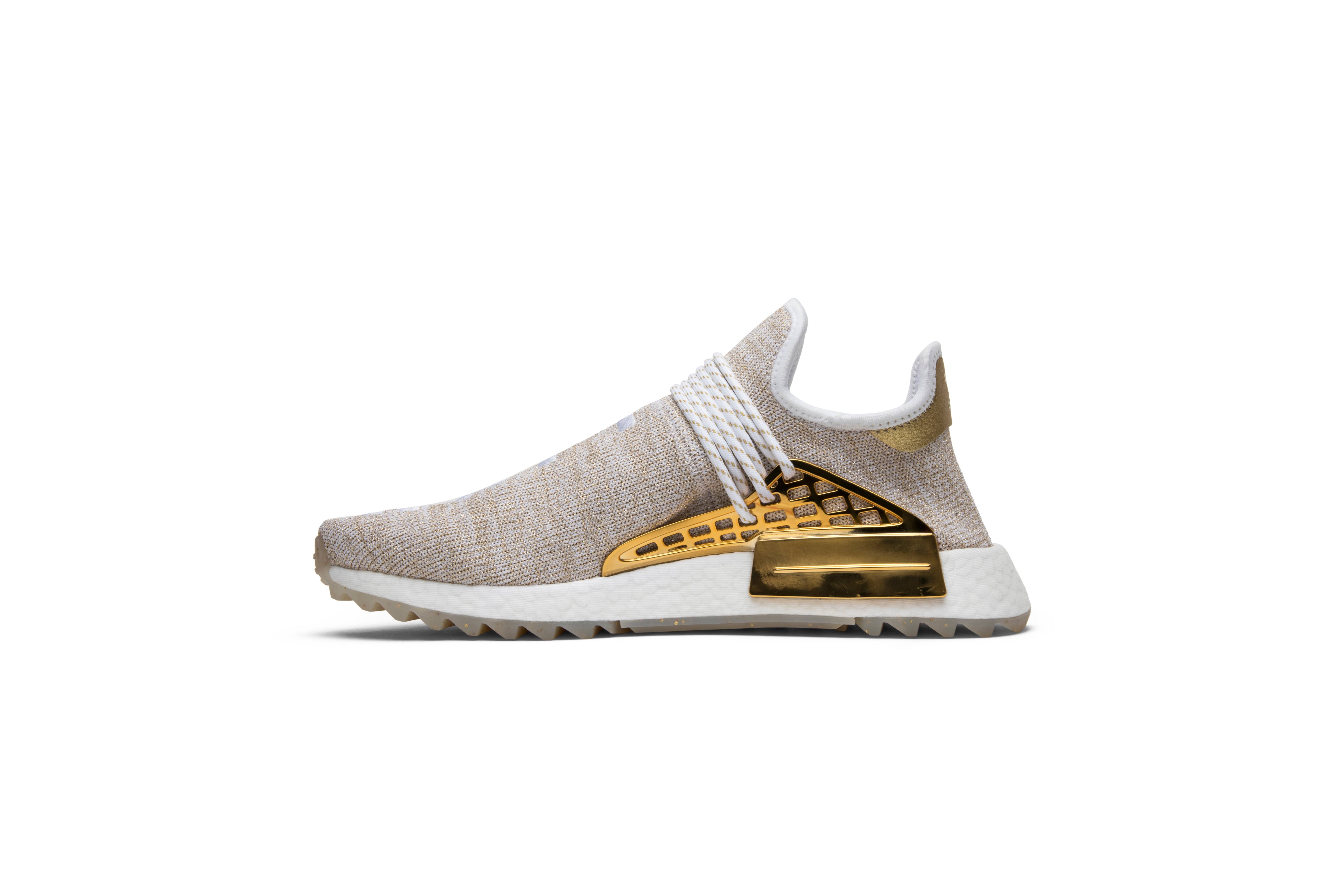 Adidas human race china gold sneakers best sale