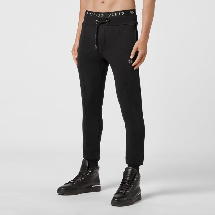 Shop PHILIPP PLEIN 黑色標誌抽繩運動針織長褲. AAAC-MJT1869-PJO002N-02