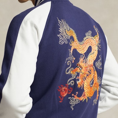 Chaqueta Azul Polo Ralph Lauren con Logo y Bordado de Dragón. MNPOKNI16823348-400 Sizing Chaqueta Azul Polo Ralph Lauren con Logo y Bordado de Dragón. MNPOKNI16823348-400