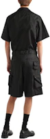 Shop PRADA Kemeja Hitam Lengan Pendek dengan Logo Segitiga Metal Badge. SC768-1WQ8_F0002-S-OOO