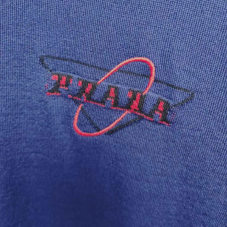 Shop PRADA  Blue Short-Sleeve Knit Sweater with Embroidered Logo. UMB045-1WIO-F0216