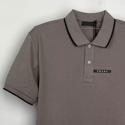 PRADA Brown Solid Letter Stripe Print Casual Polo Shirt. SIN256-322-FOBW907-R-232 Lookbook PRADA Brown Solid Letter Stripe Print Casual Polo Shirt. SIN256-322-FOBW907-R-232