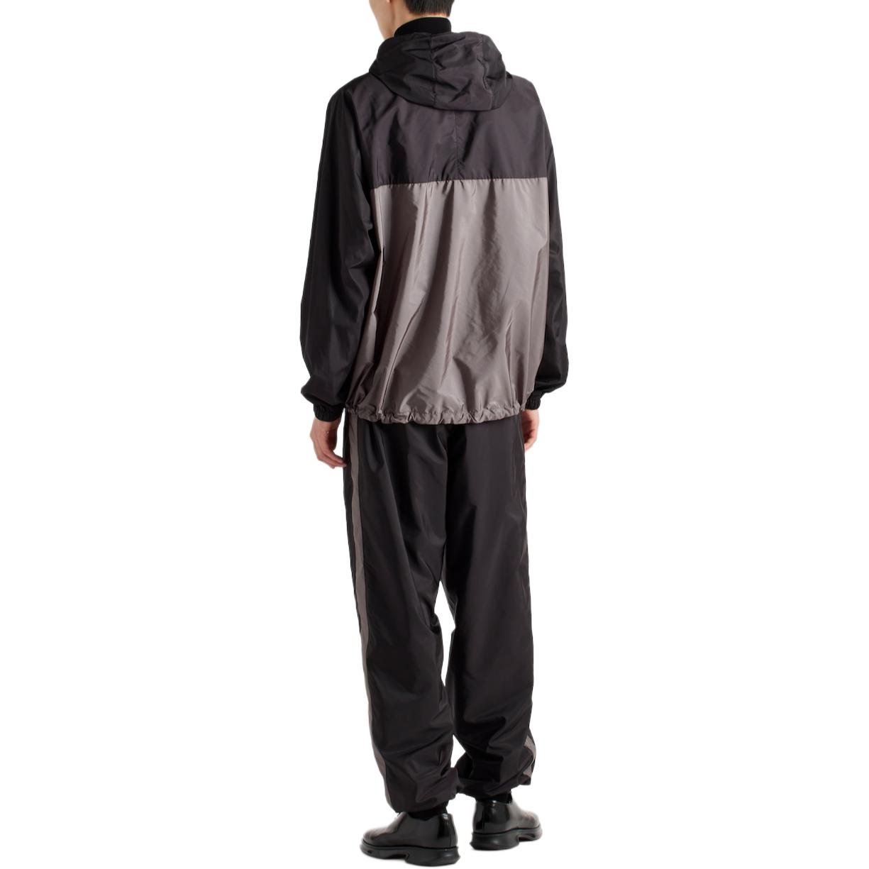 Shop PRADA FW24  Loose Fit Hooded Jacket with Logo Patch in Iron Gray. SGC601-1WQ9-F0N5A-S-BOO