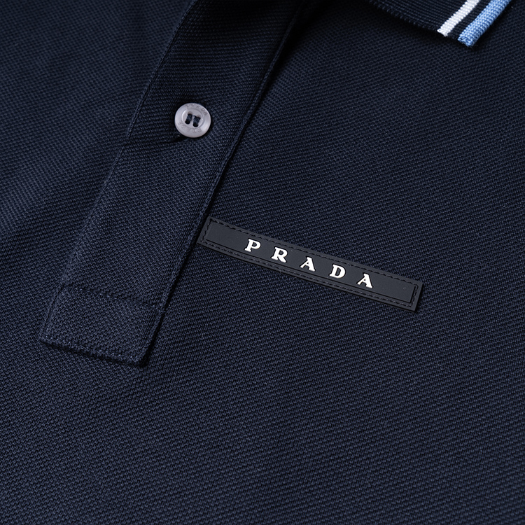 Purchase PRADA Polo de Manga Corta Azul Marino con Logo y Rayas. SJN256-322-F01AE