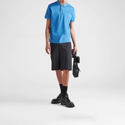 PRADA SS23 Blue Ribbed Knit Short Sleeve Polo Shirt with Logo Print. UJN765-1ZMI-F0237-S-212 Lookbook PRADA SS23 Blue Ribbed Knit Short Sleeve Polo Shirt with Logo Print. UJN765-1ZMI-F0237-S-212