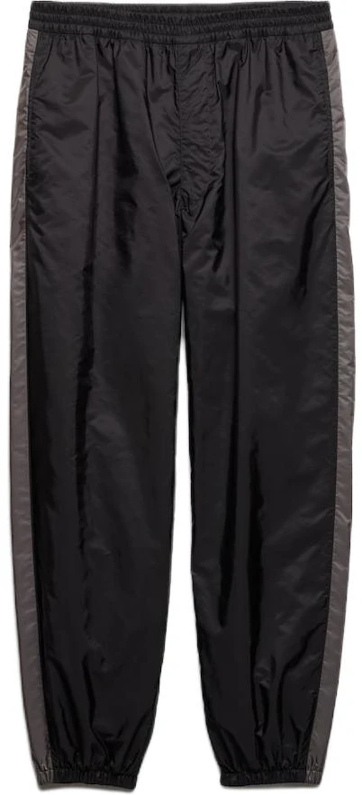 prada-ss-24-black-striped-patchwork-relaxed-fit-jogger-pants-sph-442-1-wq-9-f0-n5-a-s-ooo