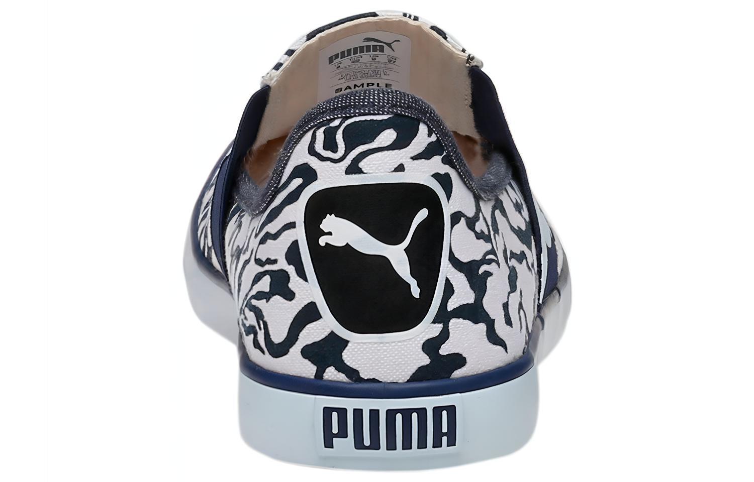 Shop Puma Lazy Slip On Gu Idp Black/White 190389-02