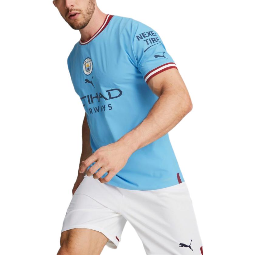 Shop PUMA 曼城 CNY 兔年標誌藍色短袖T恤 765709-01