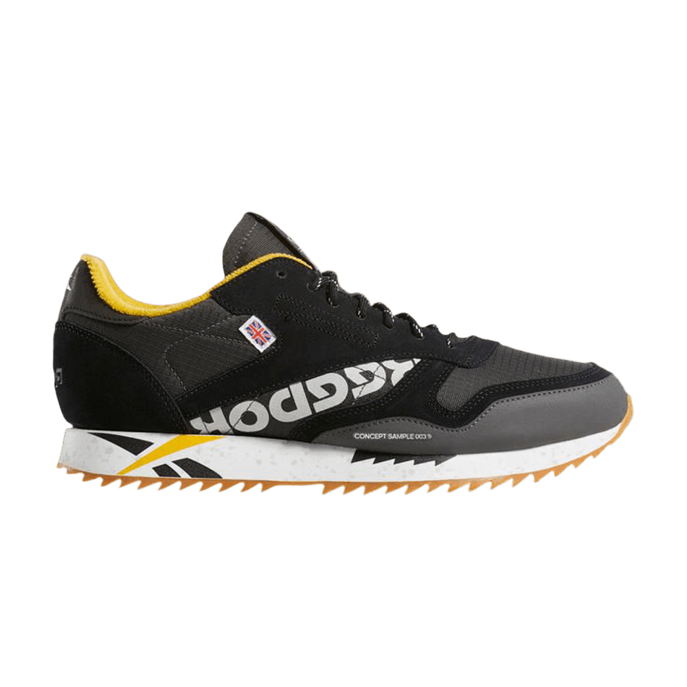 gold and black reebok