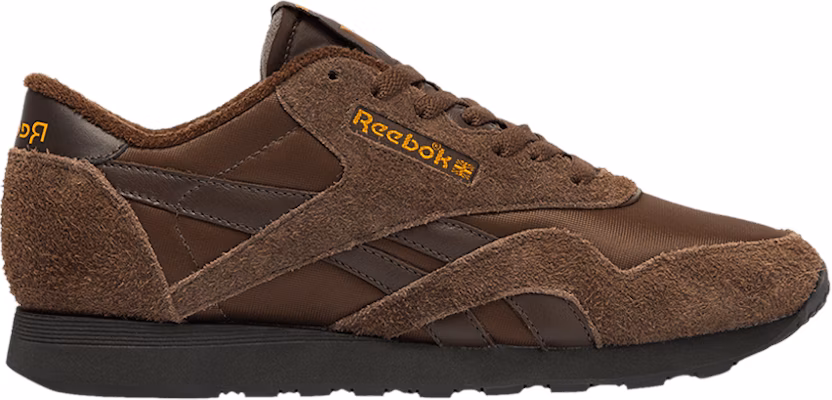 Brown reebok top trainers