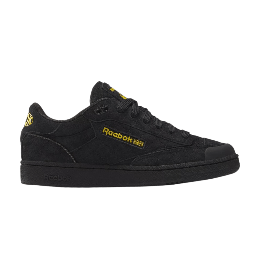 reebok black and yellow shoes