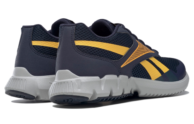 Shop 锐步 Ztaur Run '海军蓝黄' H67601