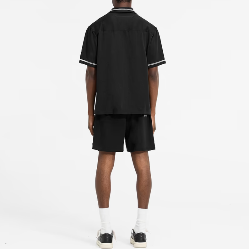 Shop REPRESENT SS24 Summer Capsule Oversized Embroidered Polo Shirt Black Mens. MLM2433-001