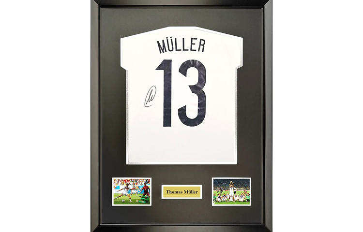 Sanwei Thomas Müller Signed Germany 2014 World Cup Jersey with SA Certificate (Framed). SW23Q4250
