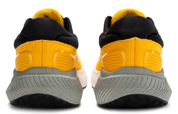 Shop Saucony Surge Low 'Negro Amarillo' S28179-3