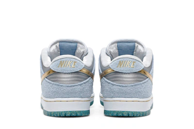 Sean Cliver x Nike SB Dunk Low 'Holiday Special' DC9936-100