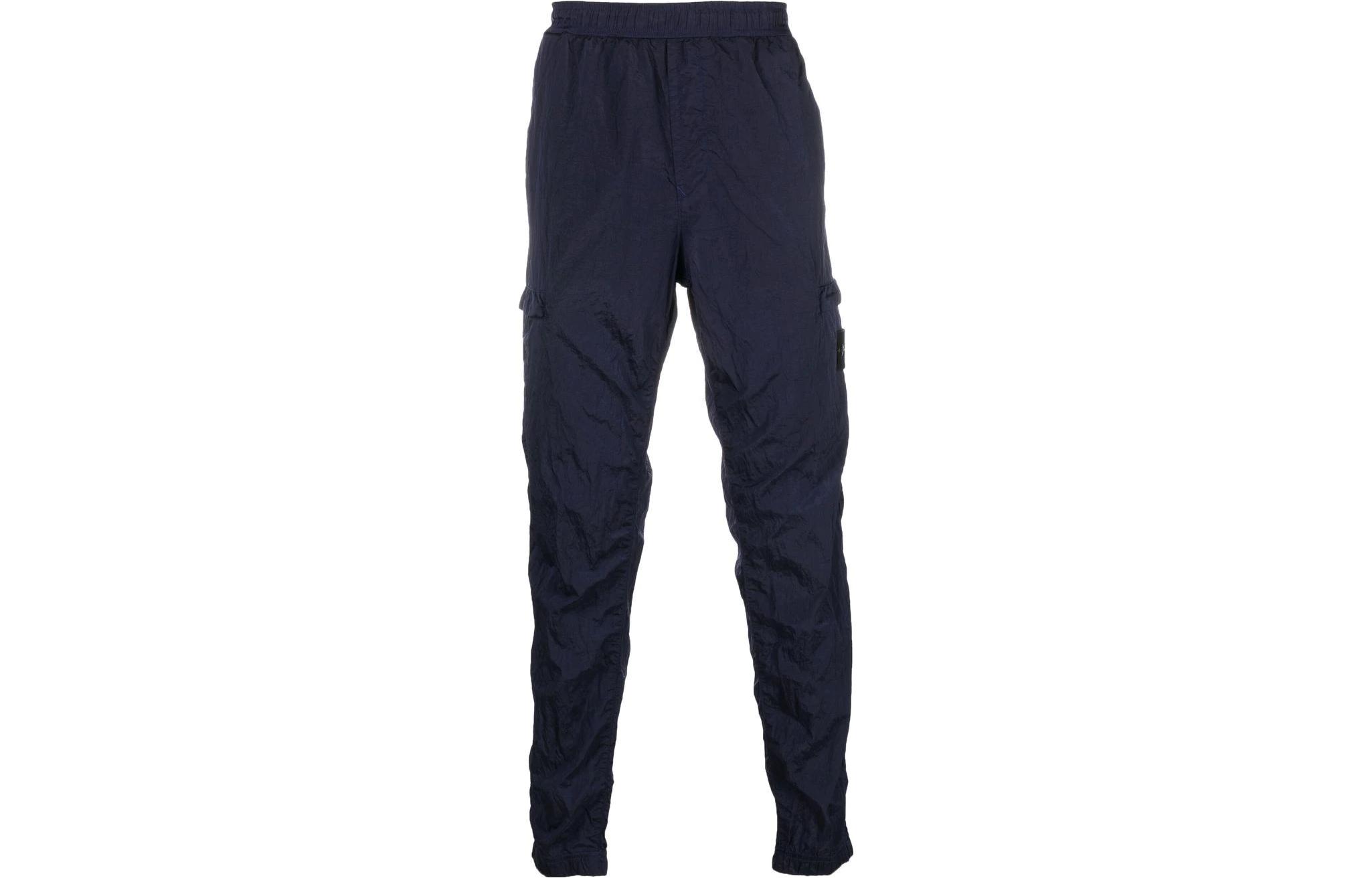 STONE ISLAND  Blue Jogger Pants with Solid Pattern and Appliqué Design. 761531021-V0027