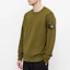 Shop STONE ISLAND Garment Dyed Olive Green Crewneck Sweatshirt with Compass Patch. 741563051-V0058