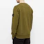 Purchase STONE ISLAND Garment Dyed Olive Green Crewneck Sweatshirt with Compass Patch. 741563051-V0058