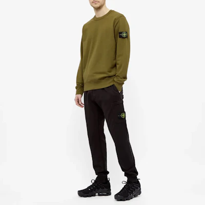 STONE ISLAND Garment Dyed Olive Green Crewneck Sweatshirt with Compass Patch. 741563051-V0058 Details for STONE ISLAND Garment Dyed Olive Green Crewneck Sweatshirt with Compass Patch. 741563051-V0058