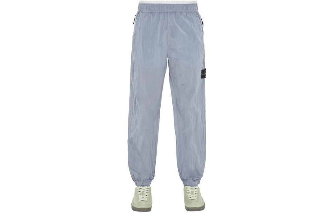 Order Pantalones Casuales Stone Island SS24 Nylon Metálico Joggers Relajados Azul Frost. 801532519-V0041