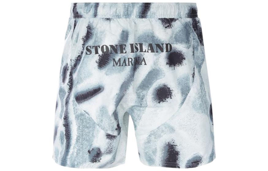 Lookbook Stone Island 綠色寬鬆版紮染彈性腰泳褲。 7615B04X8V0044