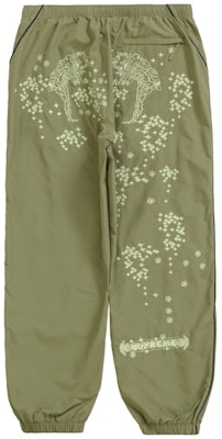 Buy Supreme AOI Glow-in-the-Dark Track Pant 'Olive' - Novelship Buy Supreme AOI Glow-in-the-Dark Track Pant 'Olive' - Novelship