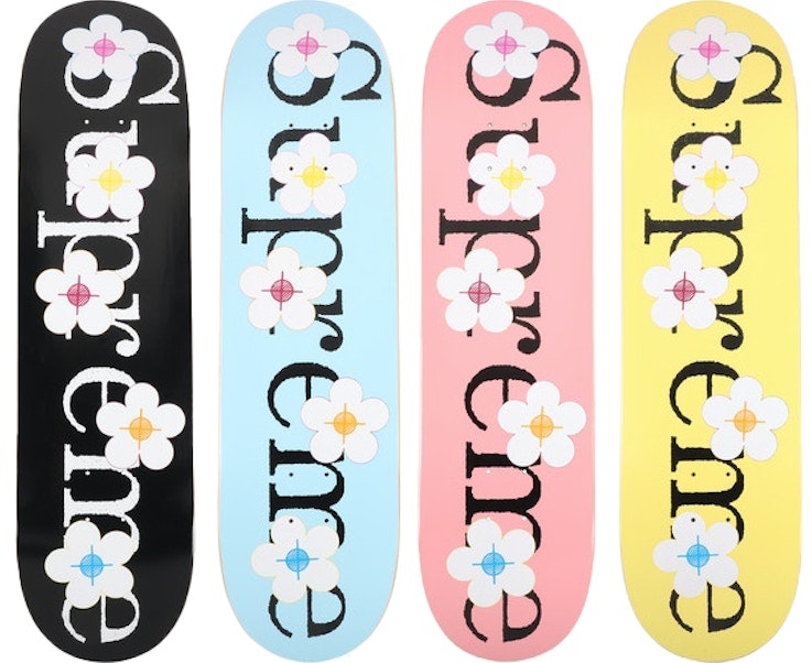 supreme-flowers-skateboard-deck-black-blue-pink-yellow-set
