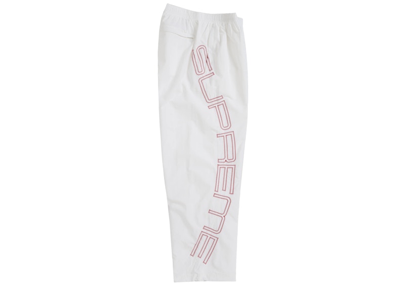 Order Supreme Spellout Embroidered Track Pant (SS25) Warna Gading.