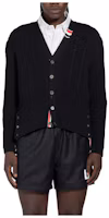 Order THOM BROWNE Black Solid Loose Fit V-Neck Button Cardigan Sweater. MKC513A-Y1024-415