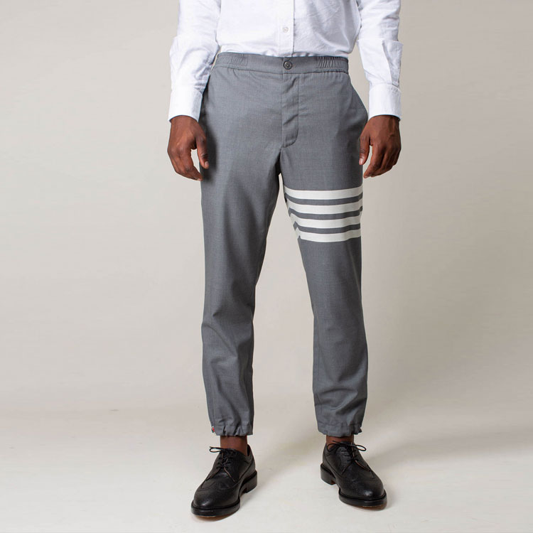 Purchase Thom Browne Pantalones Jogger de Punto Gris con Cuatro Barras Clásicas. MTT030A-06146-035