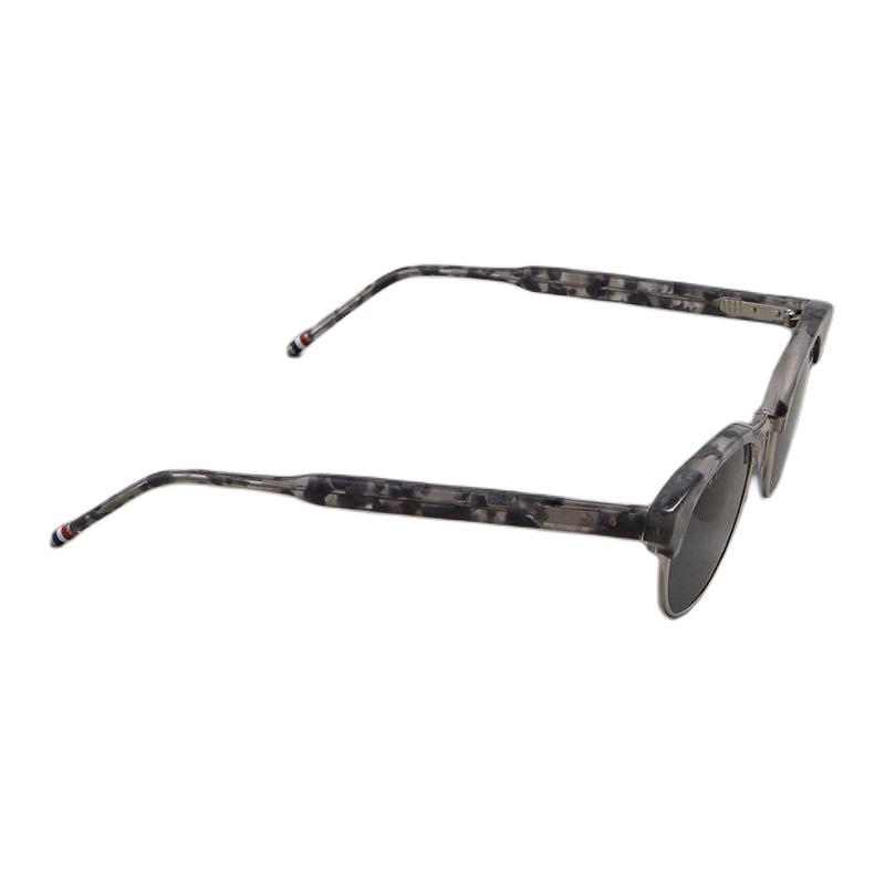 Shop Thom Browne  Titanium Oval Sunglasses Grey with Signature Temple Detail. UES702AG0003020