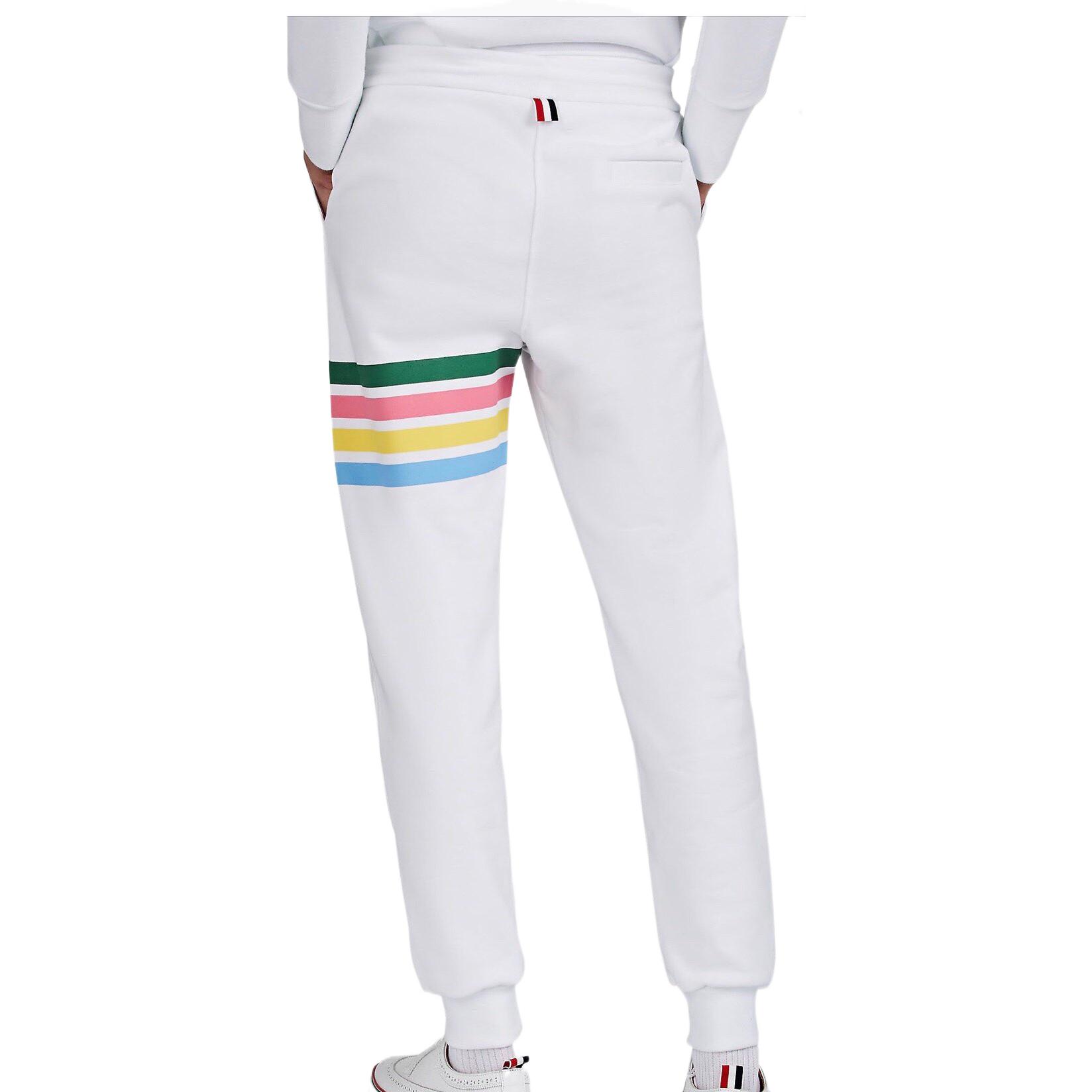 Shop Pantalones Jogger Blancos Thom Browne para Hombre con Rayas Colorblock MJQ065E-04061-100