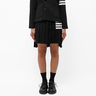 Falda Negra Plisada Thom Browne FW21 con Cuatro Rayas - Estilo Preppy. FKK090A-Y1002-001 Shop Falda Negra Plisada Thom Browne FW21 con Cuatro Rayas - Estilo Preppy. FKK090A-Y1002-001