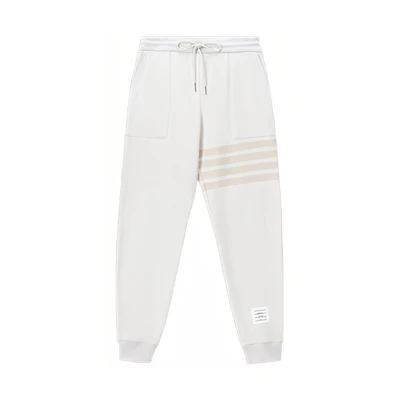 Thom Browne FW23 Natural White Knit Pants with Four-Stripe Design. MJQ177A-06910-113