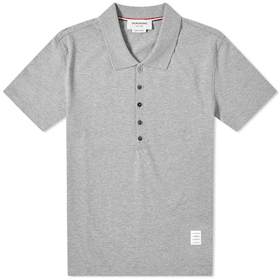 Thom Browne Polo Gris Logo Sólido Edición Verano Regreso a Clases MJP052A-00042-055 Order Thom Browne Polo Gris Logo Sólido Edición Verano Regreso a Clases MJP052A-00042-055