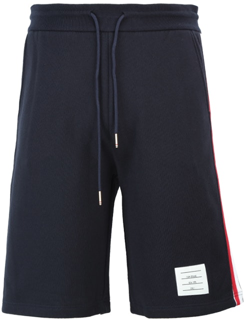 thom-browne-navy-mid-rise-casual-shorts-with-triple-stripe-detail-mjq-096-a-03377-415