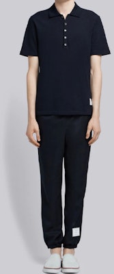 Thom Browne Polo Azul Marino con Detalle de Raya Central en la Espalda. MJP042A-00050-415 Sizing Thom Browne Polo Azul Marino con Detalle de Raya Central en la Espalda. MJP042A-00050-415