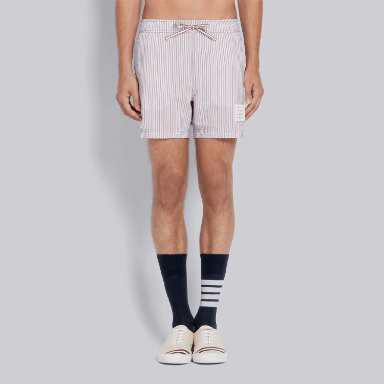 Shop トムブラウン ピンク ナイロン シアサッカーストライプ 水着 ショーツ ルーズフィット MTT022E-07319-960