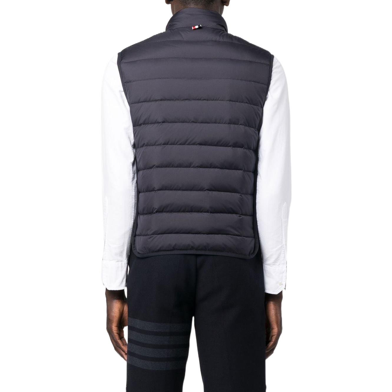 Shop Thom Browne Solid Quilted Down Vest Zip-Up Mock Neck for Men. MVD026X-F0241-415