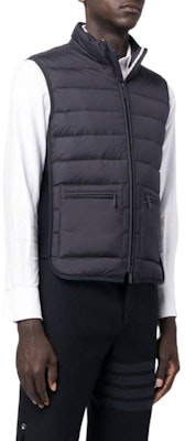 Thom Browne Solid Quilted Down Vest Zip-Up Mock Neck for Men. MVD026X-F0241-415 Purchase Thom Browne Solid Quilted Down Vest Zip-Up Mock Neck for Men. MVD026X-F0241-415