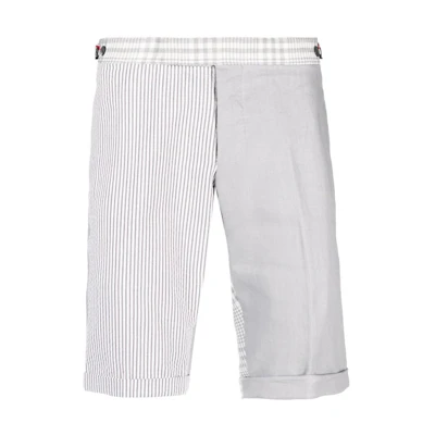 THOM BROWNE SS22 Grey Low-Rise Slim Fit Side Stripe Shorts. MTC188F-08080-055